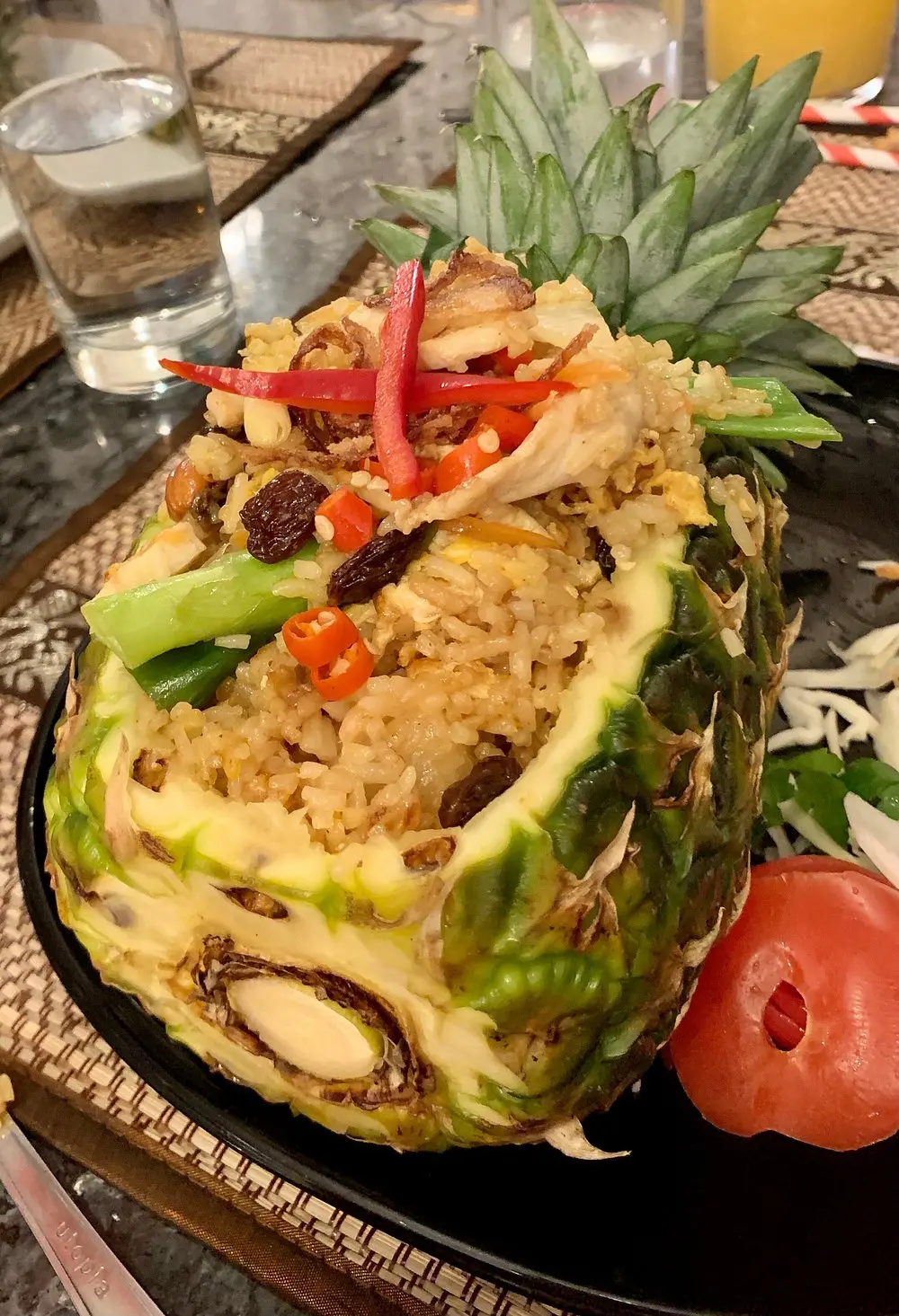 Khao Pad Sapparod — pineapple fried rice served in a pineapple at Sabannga
